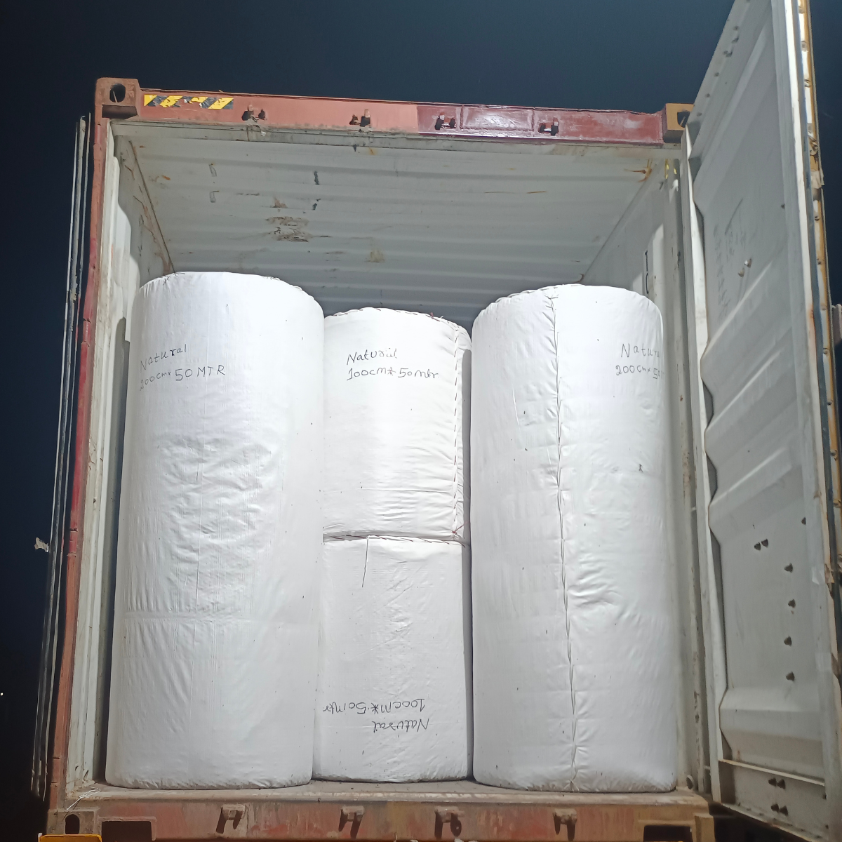 Coir matting rolls loaded inside a shipping container